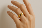 Gold Ring on finger